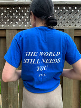 Load image into Gallery viewer, The World Still Needs You T-Shirt - Royal Blue
